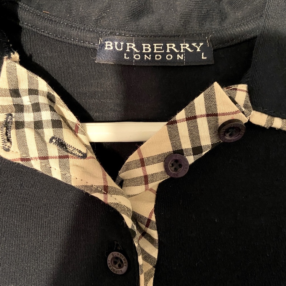 Vintage ladies small or kids large Burberry long sleeve Navy blue polo.